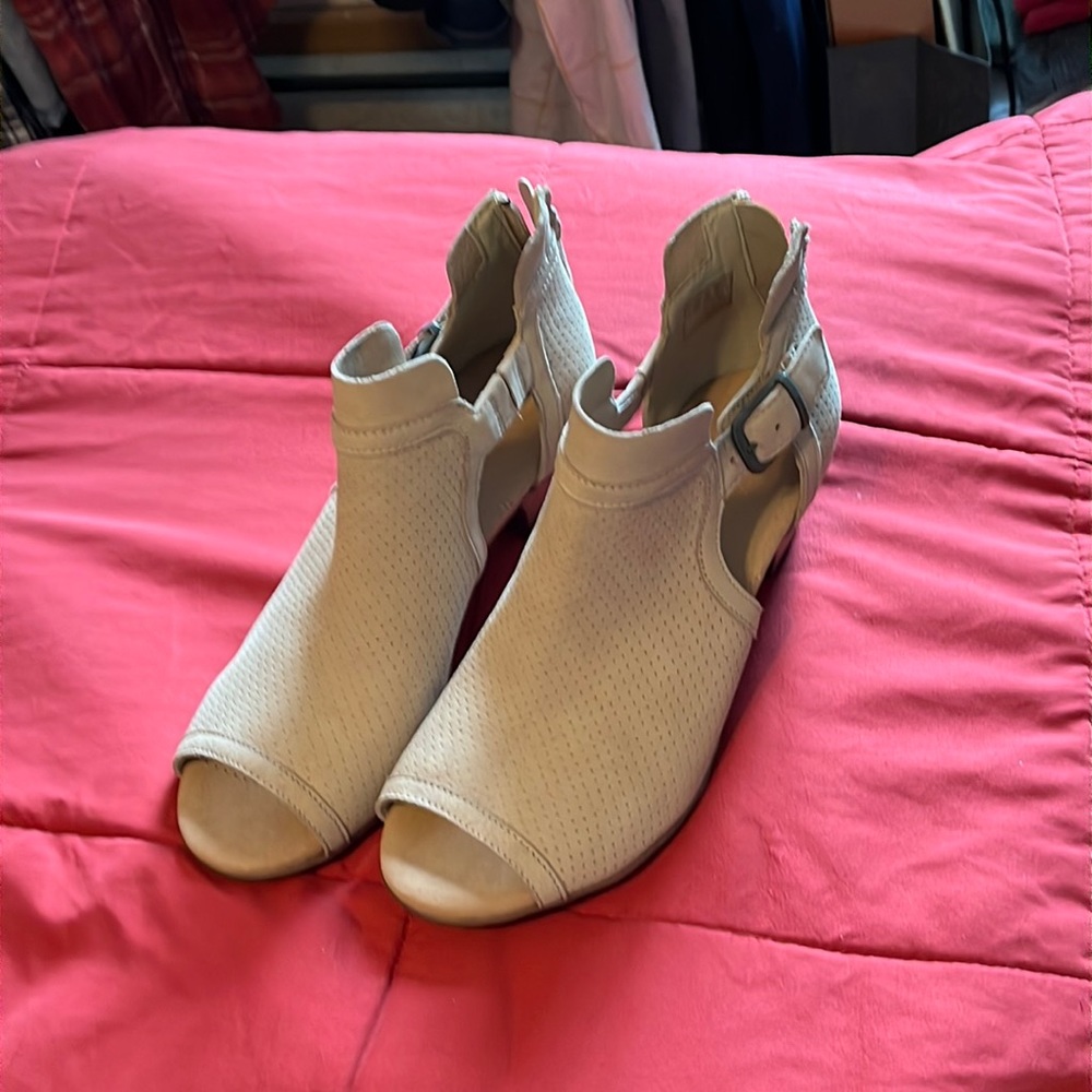 Clark’s tan booties.
